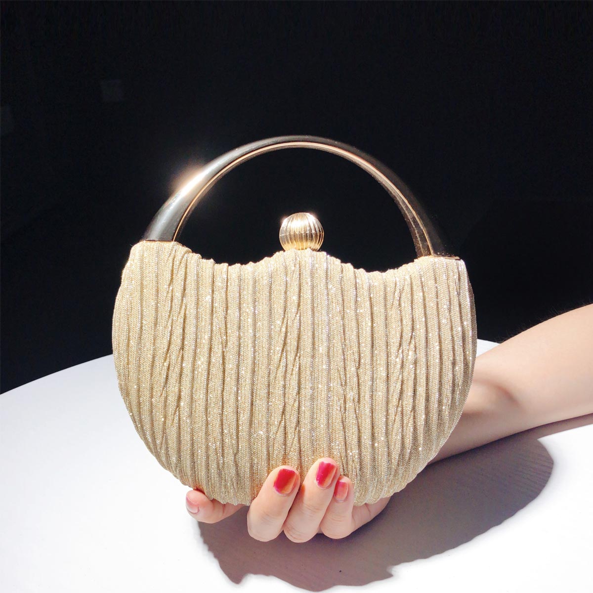 Elegant Handbag with Luxury Round Handle and Spacious Interior