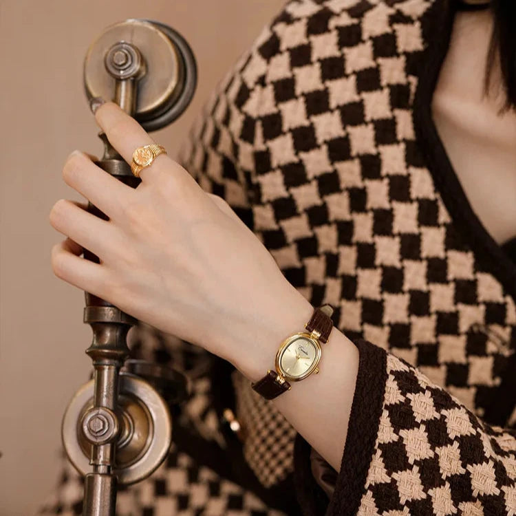 Elegant Quartz Watch Gold Dial Leather Strap Timepiece